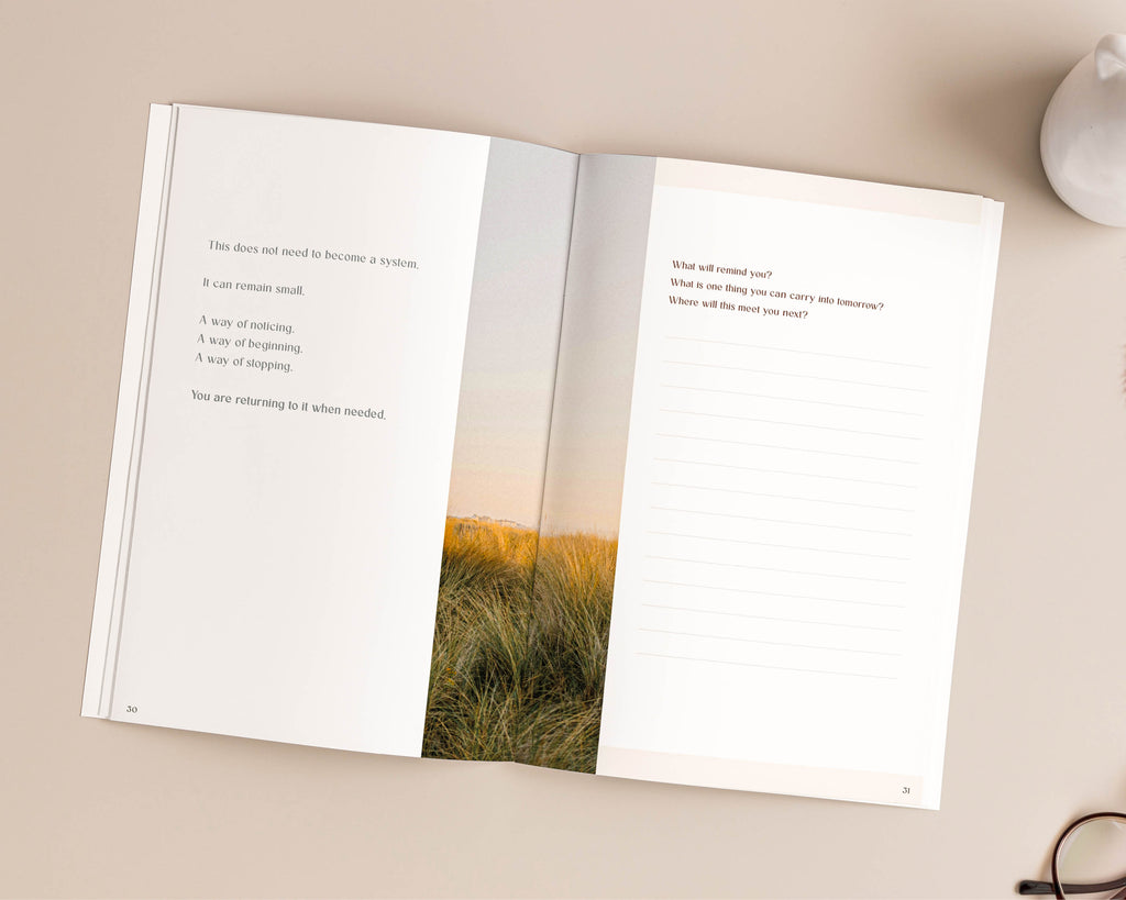 Open spread of The Off Hours 48-Hour Return workbook showing a written reflection prompt and lined response page