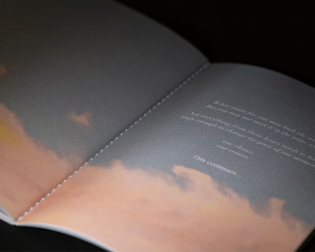 Interior spread from The 48-Hour Return with atmospheric cloud photography