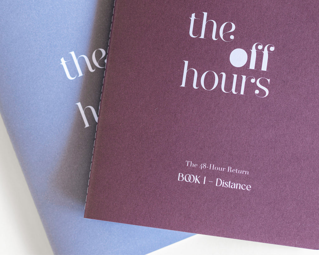 Close-up of The Off Hours logo printed on textured mauve book cover